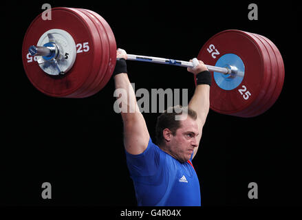 Olimpiadi - sollevamento pesi - Londra 2012 Test Event - Day Two - Excel Arena. Il kaplan di Dmitry del Kazakhstan Foto Stock