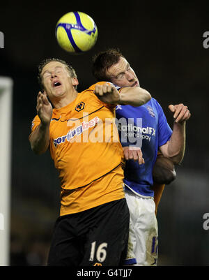 Calcio - fa Cup - terzo turno Replay - Wolverhampton Wanderers / Birmingham City - Molineux Stadium. Christophe Berra di Wolverhampton Wanderers (a sinistra) e Adam Rooney di Birmingham City Foto Stock