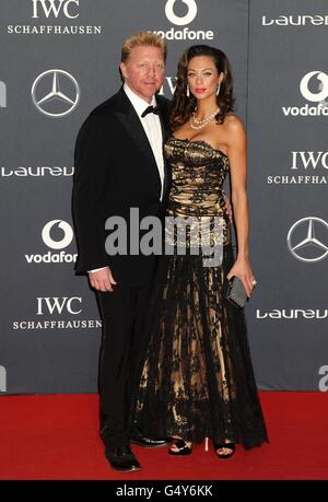 Boris Becker e la moglie Lilly arriveranno per il 2012 al Laureus World Sports Awards, presso la Central Hall Westminster, Story's Gate, Londra. Foto Stock