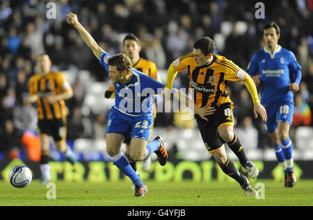 Calcio - Npower Football League Championship - Birmingham City / Hull City - St Andrews. Jonathan Spector di Birmingham (a sinistra) e Corry Evans di Hull City (a destra). Foto Stock