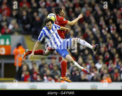 Calcio - fa Cup - Fifth Round - Liverpool contro Brighton e Hove Albion - Anfield. Brighton & Hove Albion's Will Buckley (fronte) e Sanchez Jose Enrique di Liverpool combattono per la palla Foto Stock