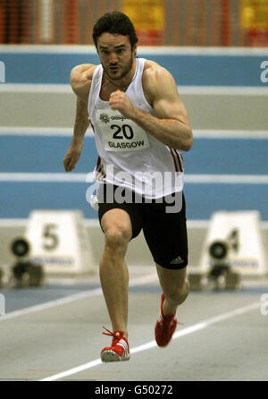 Thom Evans, partner di Kelly Brook, corre nei 60 m degli uomini alla Kelvin Hall International Sports Arena di Glasgow, durante il 31 Scottish National Senior Indoor Championshipionshiops. Foto Stock