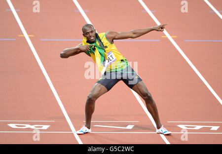 Giochi Olimpici di Londra - giorno 13. Usain Bolt in Giamaica celebra la vittoria della finale maschile di 200 m il giorno dodici dei Giochi Olimpici di Londra allo Stadio Olimpico di Londra. Foto Stock