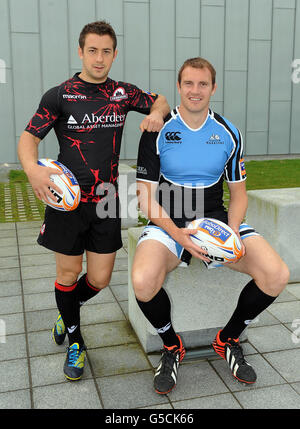 Greig Laidlaw di Edimburgo e al Kellock di Glasgow (a destra) durante il lancio del RaboDirect PRO12 al Riverside Museum di Glasgow. Foto Stock