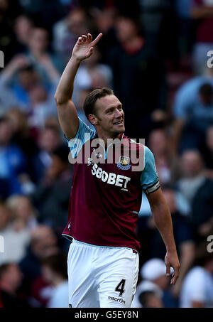 Kevin Nolan di West Ham United festeggia il raggiungimento dell'obiettivo di equalizzazione durante la partita della Barclays Premier League all'Upton Park, Londra. Foto Stock