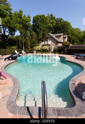 Una piscina privata, in Windermere, Orange County, Florida, Stati Uniti. Foto Stock