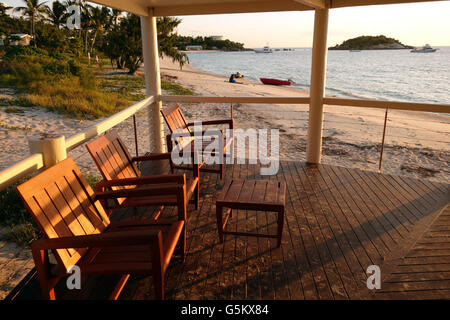 Mazzo di Marlin Bar e sulla spiaggia al tramonto, Lizard Island Resort, della Grande Barriera Corallina, Queensland, Australia. No signor o PR Foto Stock