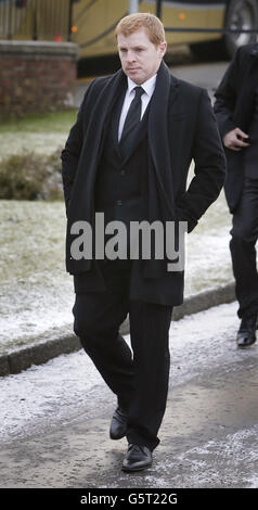 Il manager celtico Neil Lennon partecipa ai funerali dell'ex assistente manager celtico Sean Fallon presso la Chiesa di Cristo Re a Glasgow, Scozia. Foto Stock