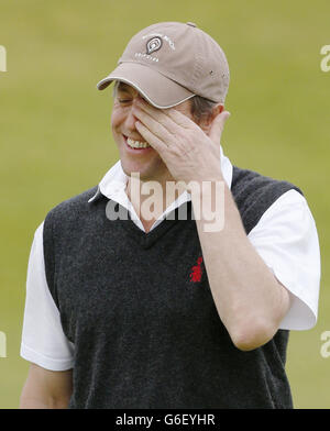 Golf - 2013 Alfred Dunhill Links Championship - Day Two - Kingsbarns. Hugh Grant durante il secondo giorno dei campionati Alfred Dunhill Links del 2013 al campo da golf Kingsbarns. Foto Stock