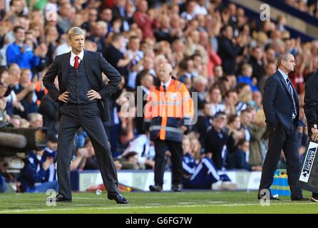 Calcio - Barclays Premier League - West Bromwich Albion / Arsenal - The Hawthorns. Arsenal manager Arsene Wenger (a sinistra) e West Bromwich Albion manager Steve Clarke sulla linea di contatto Foto Stock