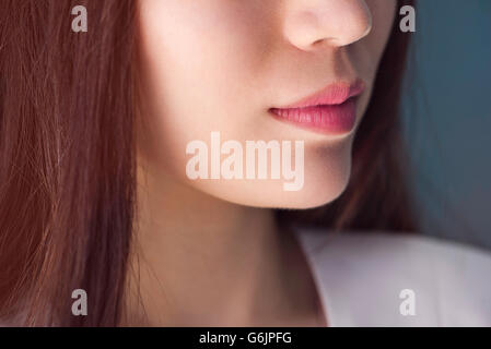 Close-up della metà inferiore del volto di donna Foto Stock