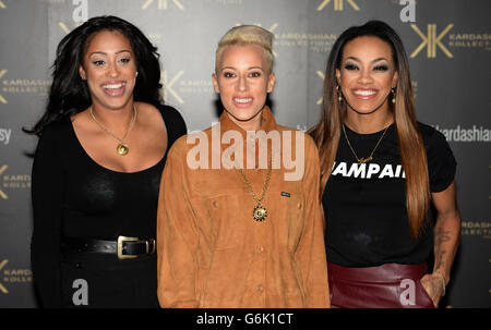 Karis Anderson (a destra), Courtney Rumbold (al centro) e Alexandra Buggs della band Stooshe frequentano il Kardashian Kollection per la festa di lancio di Lipsy al Natural History Museum di Londra. PREMERE ASSOCIAZIONE foto. Data immagine: Giovedì 14 novembre 2013. Il credito fotografico dovrebbe essere: Andrew Matthews/PA Wire Foto Stock