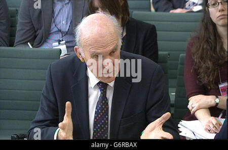 Il Business Secretary vince Cable risponde alle domande poste di fronte al Commons Business Committee di Portcullis House, nel centro di Londra, sul possibile impatto dell'indipendenza scozzese. Foto Stock