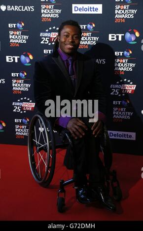 Adepitan arriva al BT Sport Industry Awards 2014 a Battersea Evolution, Londra. Foto Stock