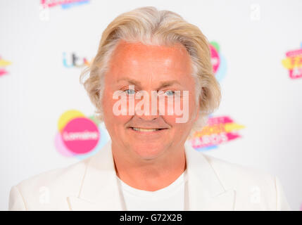 David Emanuel arriva al Lorraine's High Street Fashion Awards, a Vinopolis, nel centro di Londra. Foto Stock