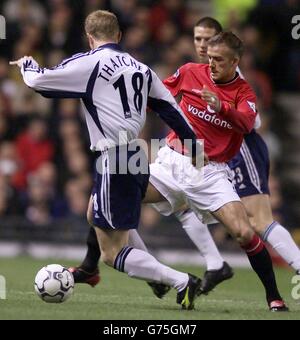 David Beckham (a destra) di Manchester United sfida ben Thatcher di Tottenham Hotspur durante la partita di premiership fa Barclaycard a Old Trafford, Manchester. Foto Stock