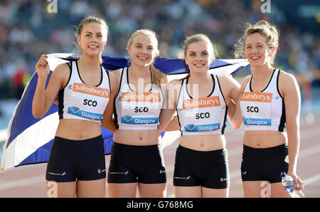 La squadra scozzese 4x100m relay, durante il giorno uno della IAAF Glasgow Diamond League Meeting a Hampden Park, Glasgow. PREMERE ASSOCIAZIONE foto. Data foto: Venerdì 11 luglio 2014. Vedi la storia della Pennsylvania ATLETICA Glasgow. Il credito fotografico dovrebbe essere: Martin Rickett/PA filo Foto Stock