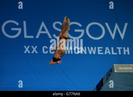 Malaysia's Chew Yiwei durante i preliminari della piattaforma da 10 m per uomini subacquei al Royal Commonwealth Pool di Edimburgo, durante i Giochi del Commonwealth di Glasgow 2014. Foto Stock
