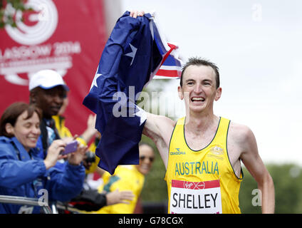 Sport - 2014 Giochi del Commonwealth - giorno quattro. Michael Shelley, Australia, vince la maratona maschile durante i Giochi del Commonwealth di Glasgow del 2014. Foto Stock