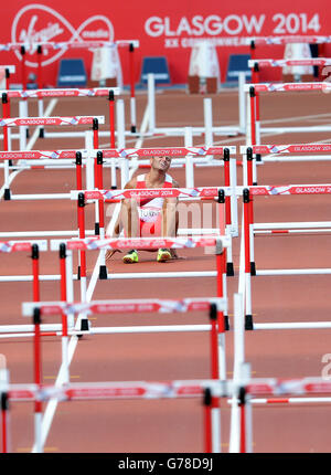 Sport - 2014 Giochi del Commonwealth - 6° giorno. Andy Turner in Inghilterra esce dagli Hurdles da 110 m a Hampden Park, durante i Giochi del Commonwealth del 2014 a Glasgow. Foto Stock