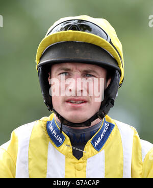 Corse di cavalli - Ippodromo di Uttoxeter. Tom o'Brien, Jockey Foto Stock