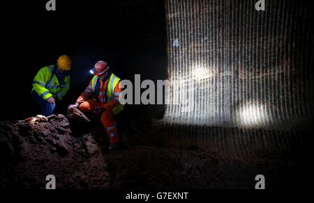 Bussola miniera di sale minerale. I minatori lavorano alla superficie del sale, a 500 metri sotto la superficie della miniera di sale minerale Compass di Winsford, Cheshire. Foto Stock