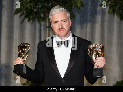Anthony McCarten, vincitore del Best Adapted Screenplay per "The Theory of Everything", partecipa alla festa dopo lo spettacolo per l'EE British Academy Film Awards al Grosvenor House Hotel nel centro di Londra. Foto Stock