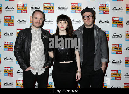 (Da sinistra a destra) Iain Cook, Lauren Mayberry e Martin Doherty of Chvrches partecipano ai NME Awards 2015 con Austin, Texas, all'O2 Brixton Academy di Londra. PREMERE ASSOCIAZIONE foto. Data immagine: Mercoledì 18 febbraio 2015. Vedere la storia di PA SHOWBIZ NME. Il credito fotografico dovrebbe essere: Filo Yui Mok/PA Foto Stock