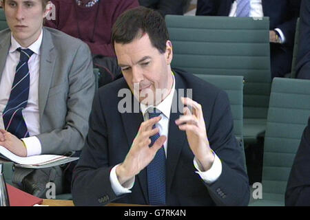 Il Cancelliere dello scacchiere George Osborne risponde alle domande poste di fronte al Treasury Select Committee della Camera dei Comuni di Londra sul tema del bilancio 2015. Foto Stock