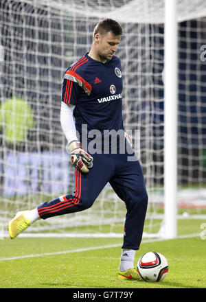 Il portiere scozzese David Marshall si riscalda per l'International friendly a Hampden Park, Glasgow. PREMERE ASSOCIAZIONE foto. Data immagine: Mercoledì 25 marzo 2015. Scopri la storia di calcio della Pennsylvania Scotland. Il credito fotografico dovrebbe essere: Kirk o'Rourke/PA Wire. RESTRIZIONI: L'uso è soggetto a limitazioni. . Uso commerciale solo previo consenso scritto della fa scozzese. Per ulteriori informazioni, chiamare il numero +44 (0)1158 447447. Foto Stock