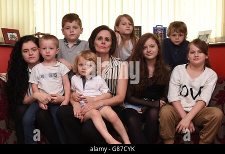 I genitori minacciati di corte in assenza dei bambini Foto Stock