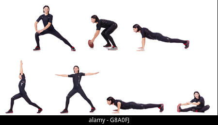 Giovane uomo facendo esercizi su bianco Foto Stock