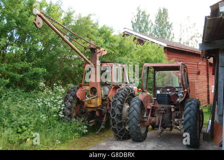 Red vecchio trattore agricolo Foto Stock