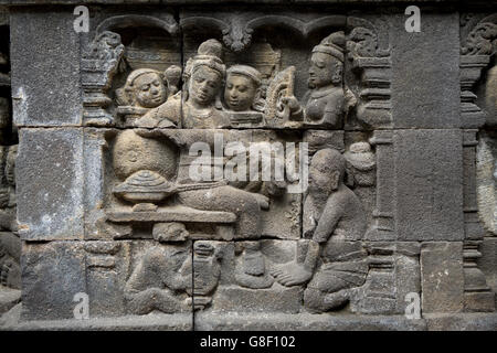 Le sculture a Borobudur Sito Patrimonio Mondiale, un 9th-secolo Mahayana tempio buddista in Magelang, Java Centrale Foto Stock