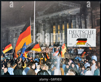 Germania - circa 1990: una cartolina A Stampato in Germania dedicata alla riunificazione tedesca, circa 1990 Foto Stock