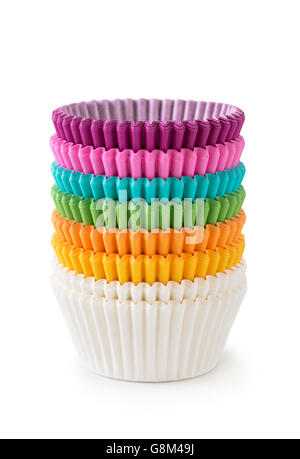 Pila di coloratissimi cupcake casi isolati su sfondo bianco Foto Stock