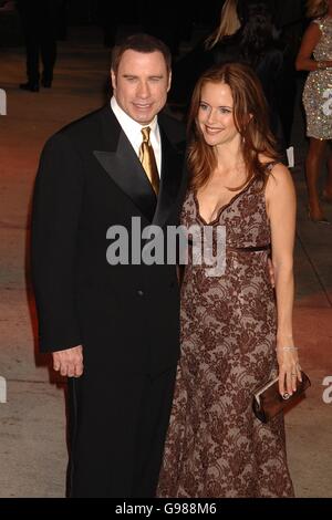 Vanity Fair Post Oscars Party - Mortons Restaurant. John Travolta e la moglie Kelly Preston arrivano sul tappeto rosso. Foto Stock