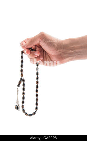 Maschio con mano Rosario isolati su sfondo bianco Foto Stock