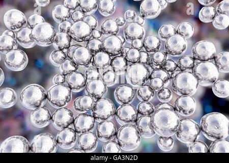 Nanoparticelle di argento, computer grafica. La nanotecnologia consiste nella progettazione di sistemi su scala dal microscopico verso il basso. Queste nanoparticelle sono state costruite in corrispondenza di una scala abbastanza piccolo per interagire con le singole molecole. Le nanoparticelle come questo potrebbe essere utilizzato per la consegna di farmaci mirati a trattamenti particolari zone del corpo. Alcune delle altre possibili applicazioni di nanoparticelle includono l'uso di dati meteorologici, geofisiche, biologico e sensori di sorveglianza. Foto Stock