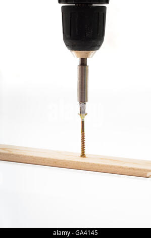 Avvitamento witn cacciavite elettrico Foto Stock