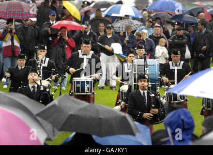 I membri dell'Oran Mor Pipband si esibiscono durante i Campionati mondiali di Pipe Band a Glasgow. Foto Stock