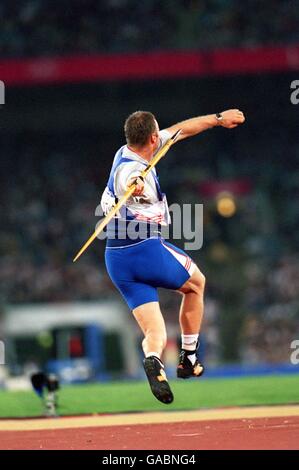 Olimpiadi di Sydney 2000 - Javelin uomo. La Gran Bretagna Mick Hill in azione Foto Stock