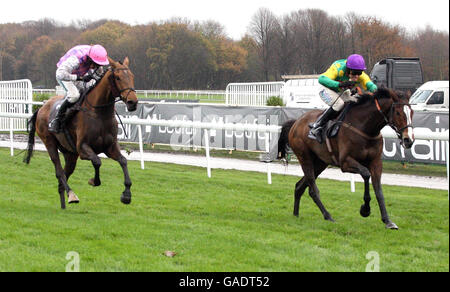 Kauto Star e jockey Sam Thomas (a destra) vincono Betfair Chase all'ippodromo di Haydock Park. Foto Stock