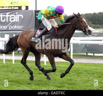 Kauto Star e Sam Thomas si aggiudicano il Betfair Chase all'ippodromo di Haydock Park. Foto Stock