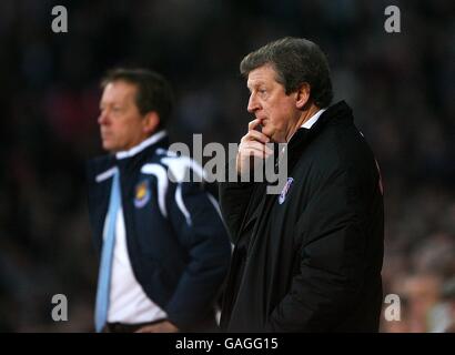 Roy Hodgson, manager di Fulham (r) e Alan Curbishley, manager di West Ham United. Foto Stock