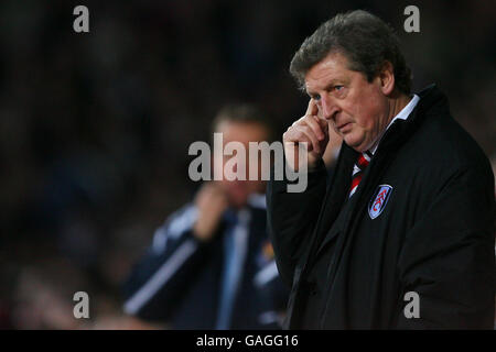 Roy Hodgson, manager di Fulham (r) e Alan Curbishley, manager di West Ham United. Foto Stock