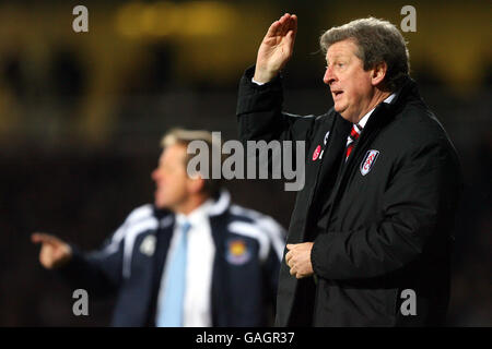 Roy Hodgson, manager di Fulham, e Alan, manager di West Ham United Curbishley Foto Stock