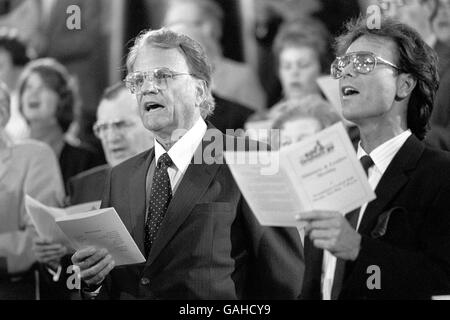 La religione - Billy Graham e Cliff Richard - Westminster Central Hall di Londra Foto Stock