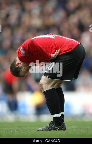 Wayne Rooney del Manchester United lotta per scuotere un infortunio Foto Stock