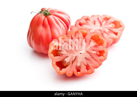 Coeur de boeuf. Bistecca di manzo pomodori isolati su sfondo bianco. Foto Stock